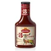 A bottle of paprika sauce against a white background. Podgląd zdjęcia produktu