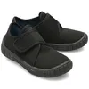 A pair of black children's shoes with velcro straps. Podgląd zdjęcia produktu