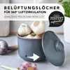 A ceramic garlic keeper filled with garlic, with its lid off to the side, on a countertop. Produktbild-Vorschau