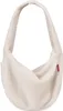 A cream-colored fuzzy sling bag is shown against a white background.