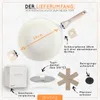 A flat lay image showing a collection of kitchenware items, including a pan, lid, packaging, and cleaning accessories, with descriptive text and arrows pointing to each item. Produktbild-Vorschau