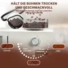A close-up marketing image of a coffee grinder and beans, highlighting grind settings and extraction. Produktbild-Vorschau