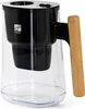 A water filter pitcher with a black filter housing and a wooden handle, set against a white background. Podgląd zdjęcia produktu