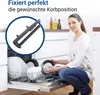 A woman loading a dishwasher with plates. Produktbild-Vorschau