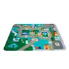 A colorful play mat depicting a town with roads, buildings, and a park. Anteprima dell’immagine prodotto