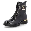 A black patent leather boot with a crocodile texture, black laces, and gold accents. Produktbild-Vorschau