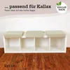 A white Kallax shelving unit with three beige striped cushions on top, placed on a wooden floor in front of a white wall. Náhled obrázku produktu