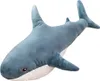 A plush toy shark on a white background. Podgląd zdjęcia produktu