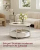 A living room scene with a coffee table, sofa, and armchair. Produktbild-Vorschau