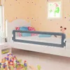 A child's bedroom with a bed, toys, and a bed rail. Produktbild-Vorschau