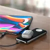 A Satechi Quatro Wireless Power Bank is shown charging an iPhone and AirPods, with a tablet in the background. Produktbild-Vorschau