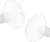 Two clear breast pump flanges with a white leaf pattern are shown against a white background. Voir les images du produit