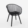 A black chair with a woven seat and a slatted back and arms, shown from a front-side angle against a white background. Produktbild-Vorschau
