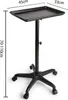 A black salon trolley with a tray top and a wheeled base, shown against a white background. Dimensions are indicated by text overlays. Podgląd zdjęcia produktu