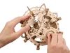 Hands assembling a wooden mechanical puzzle. Podgląd zdjęcia produktu