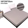 A fitted sheet is shown on a bed with two white pillows. Produktbild-Vorschau