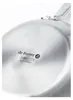 Close-up of the bottom of a stainless steel pan with branding and manufacturing information. Náhled obrázku produktu