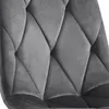 A close-up view of the tufted upholstery of a chair. Náhled obrázku produktu
