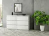 A modern living room setting with a white dresser, artwork, and a potted plant. Produktbild-Vorschau