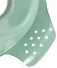 A close-up of a green child's toilet seat with white polka dots and a white rim. Voir les images du produit