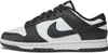 A side view of a Nike Dunk Low Retro sneaker in white and black. Produktbild-Vorschau