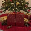 A Christmas tree with gifts and an advent calendar underneath. Produktbild-Vorschau