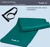 A teal yoga mat is partially unrolled on a light blue background, with a black carrying strap and the brand logo visible. Náhľad obrázku produktu
