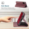 A hand is shown interacting with a phone case that has a kickstand feature, demonstrating its hands-free functionality. The image also includes a smaller inset image of the phone case in its folded state. Produktbild-Vorschau