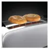 Two bagels are placed on a toaster rack, with the heating elements visible below. Podgląd zdjęcia produktu