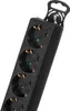 A close-up view of a black power strip with multiple outlets. Náhľad obrázku produktu