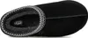 A black UGG slipper shown from a top-down perspective, highlighting the interior lining and decorative stitching. Produktbild-Vorschau