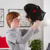 A young boy is holding a Darth Vader mask in front of him, looking at it. Anteprima dell’immagine prodotto