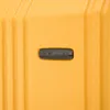 A close-up shot of a yellow suitcase with a black logo. Produktbild-Vorschau