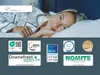 A woman is lying in bed, smiling. Below her are several certification logos and product information. Produktbild-Vorschau