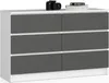 A white dresser with graphite gray drawers is displayed against a white background. A black camera and a stack of books are on top of the dresser. Anteprima dell’immagine prodotto