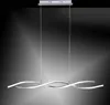 A modern, wavy pendant light fixture hanging from thin wires against a dark, gradient background. Náhled obrázku produktu