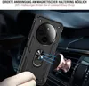 A hand holding a black phone case with a ring holder, near a car air vent with a magnetic car mount. Produktbild-Vorschau