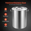 A large stainless steel pot with a lid and handles, presented against a dark background with feature callouts. Voir les images du produit