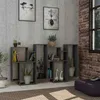 A modern living room with a bookshelf filled with books and decorative items. Produktbild-Vorschau
