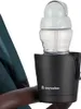 A close-up of a black cup holder with a baby bottle inside, attached to a stroller handle. Produktbild-Vorschau