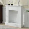 A white fireplace surround is shown in a room with decorative elements on top. Produktbild-Vorschau