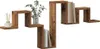 A wooden zig-zag wall shelf with books and a decorative item. Produktbild-Vorschau