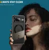 A woman is holding a clear phone case with a Google Pixel phone inside, against a blue background. Náhled obrázku produktu