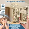 A child looking up at a ceiling light in a room with bookshelves. Náhled obrázku produktu