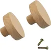 Two wooden knobs and two screws on a white background. Produktbild-Vorschau