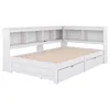 A white bed frame with built-in shelving and drawers, shown from a diagonal angle against a white background. Podgląd zdjęcia produktu