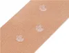 A close-up, angled view of a beige fabric band with three clear, circular adhesive pads on it. Náhled obrázku produktu