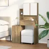 A dressing table with a stool and storage units in a bedroom setting. Voir les images du produit