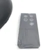 A remote control for a fan is shown on a white background. Voir les images du produit