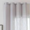 A close-up view of a gray, eyelet curtain hanging on a white curtain rod. Produktbild-Vorschau